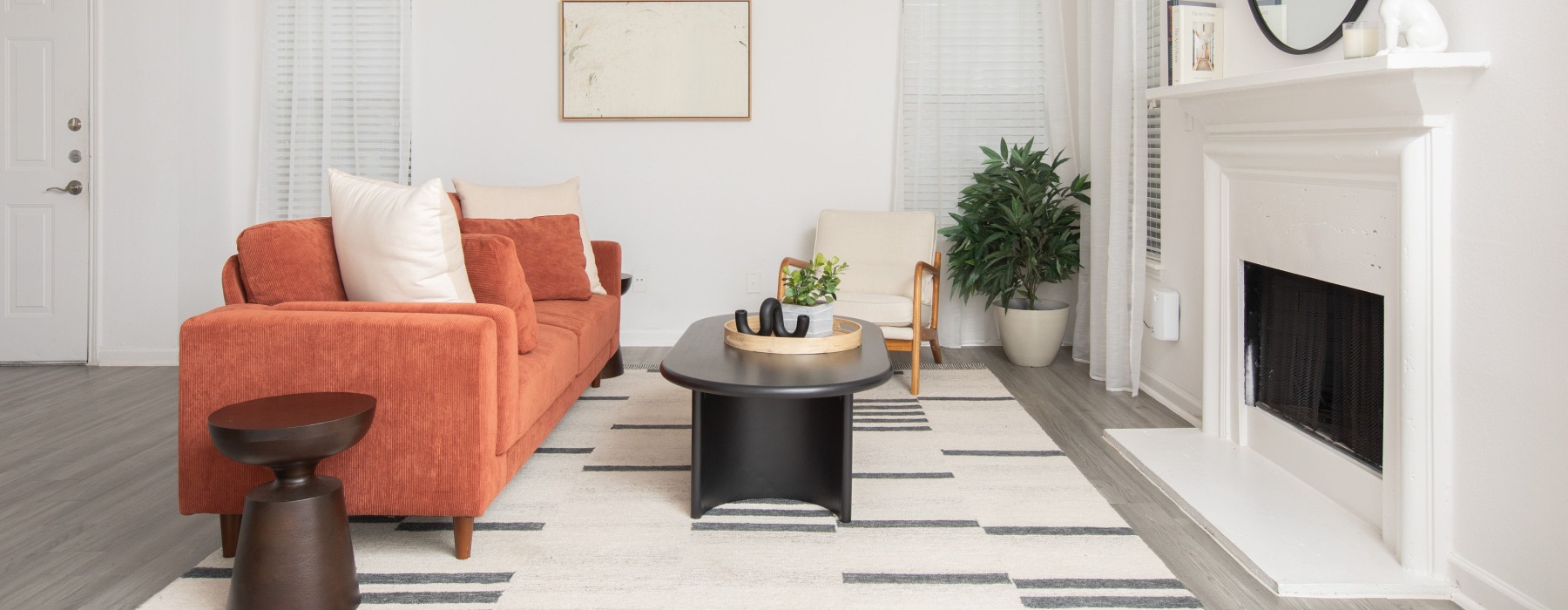 Interior Apartment with chic furniture and living room fireplace