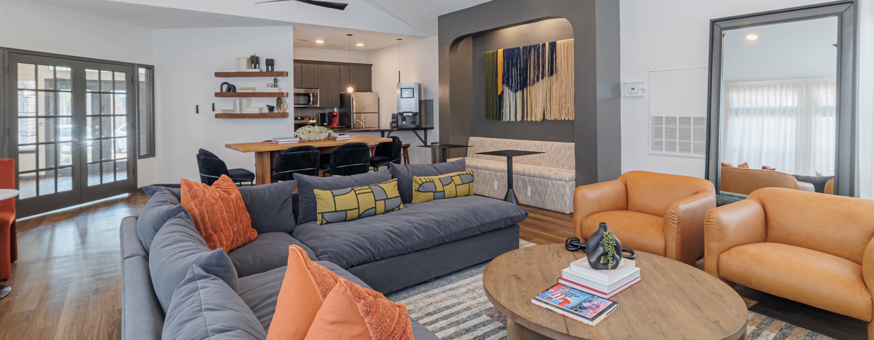 clubroom with kitchen and seating