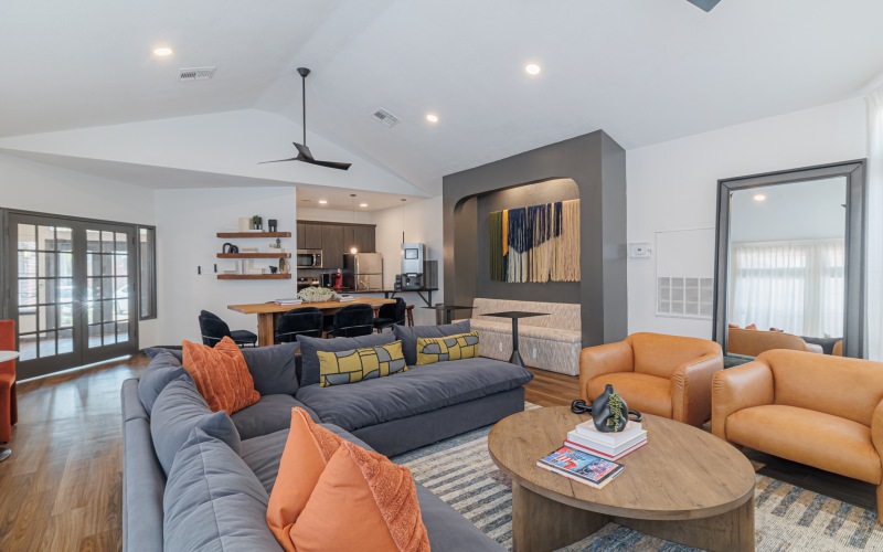 clubroom with kitchen and seating