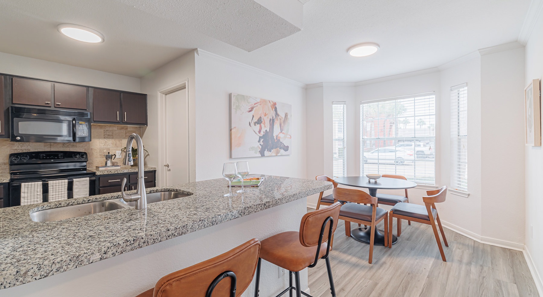 kitchen and dining room with seating
