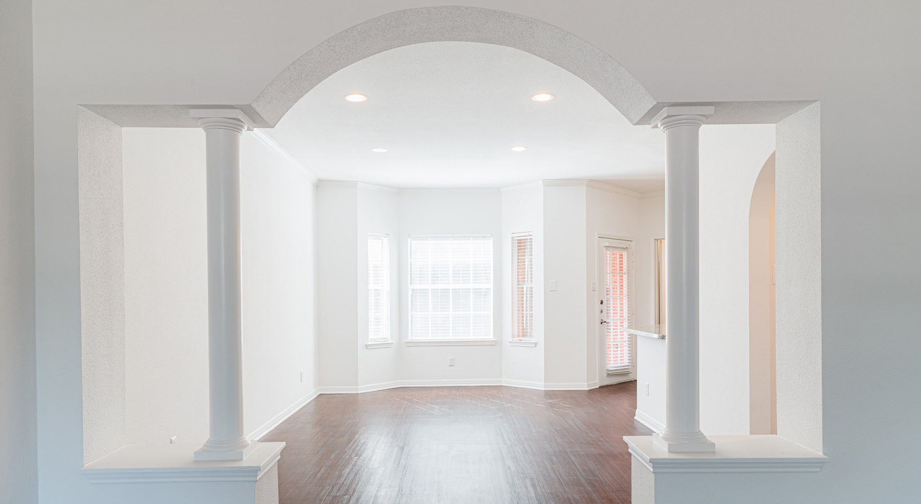 dining room with hardwood floors and windows
